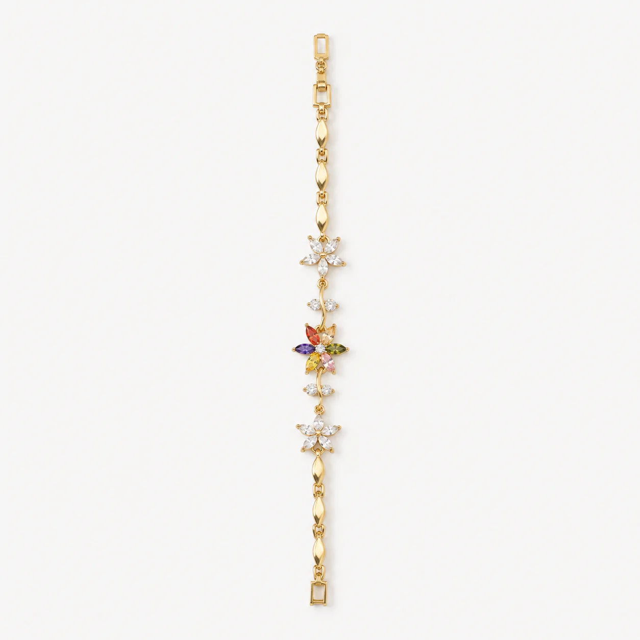 Gold bracelet with multicolor and clear crystal flowers shown flat