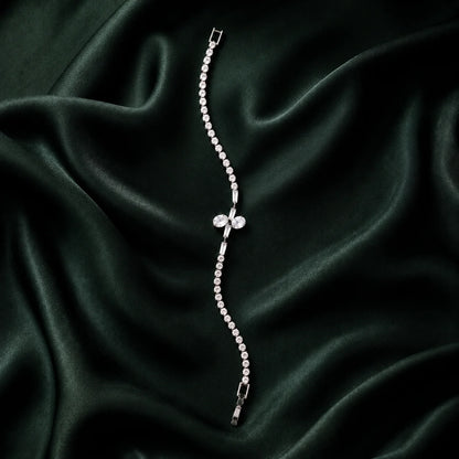 Silver crystal bracelet with bow detail in a full product view