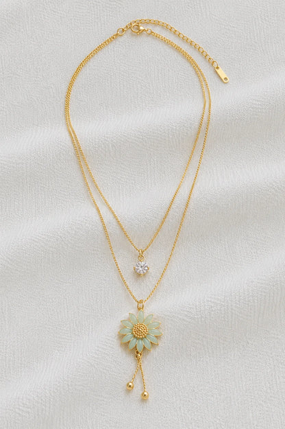 Layered gold necklace with mint flower pendant full product view